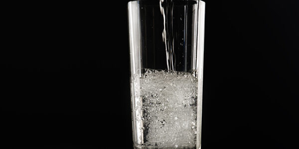 A water glass filled with water