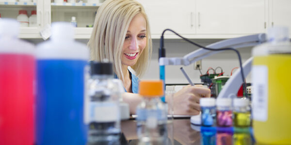 Second-year dental student Christina Barry, one of TAMBCD's predoctoral student research fellows, works in the lab.