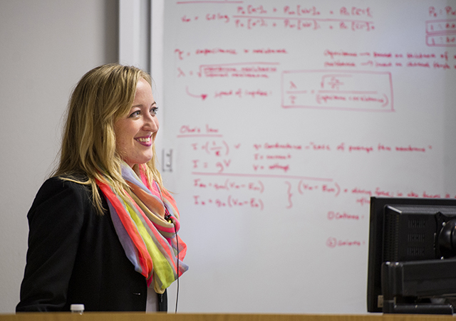 Marybeth Francis, DMD/PhD student at the University of Illinois at Chicago, talks to a TAMBCD audience on April 16.