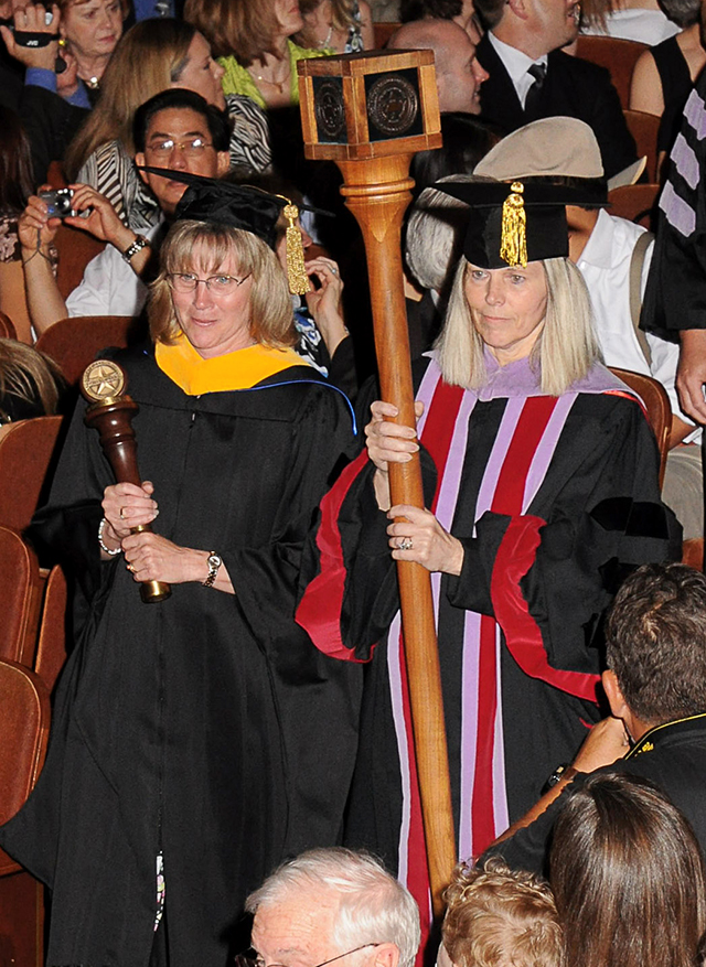 Muzzin, left and Mash at 2009 commencement exercises