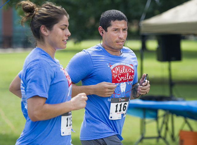 Alina Garciamendez-Rowold and Marcus Montalvo run at the June 27 Miles for Smiles Runathon. 