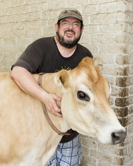 Kavanagh with Bumblebee, one of three female Jersey cows he and his wife, Lela, own. 