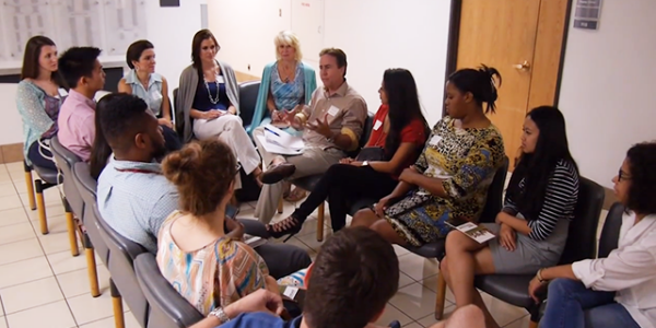 Dr. Kevin Seidler talks with students during the first meeting of the Great Expectations program for the 2015-2016 academic year.