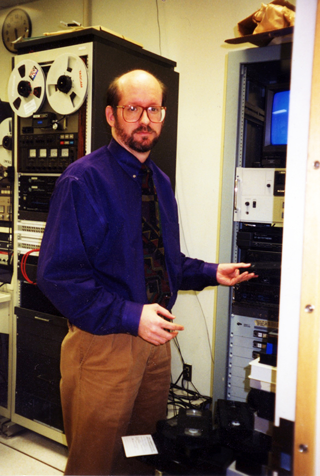 Frederick, with an analog reel-to-reel tape recorder