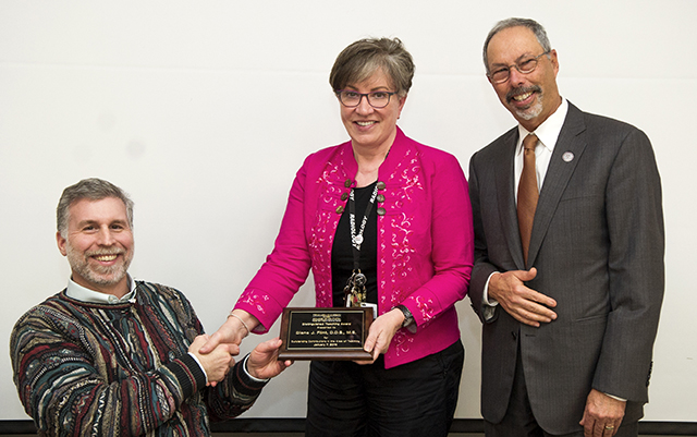 Left to right: Benson, Dr. Diane Flint, Wolinsky. 