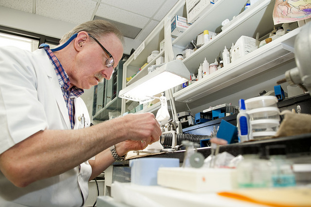 Steve Ruff at his workspace in the college's Center for Maxillofacial Prosthodontics.