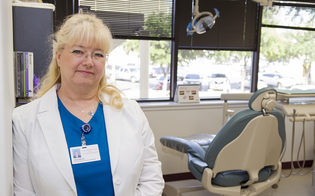 Linda Brock, program coordinator, stands in the clinic at the Center for Facial Pain and Sleep Medicine