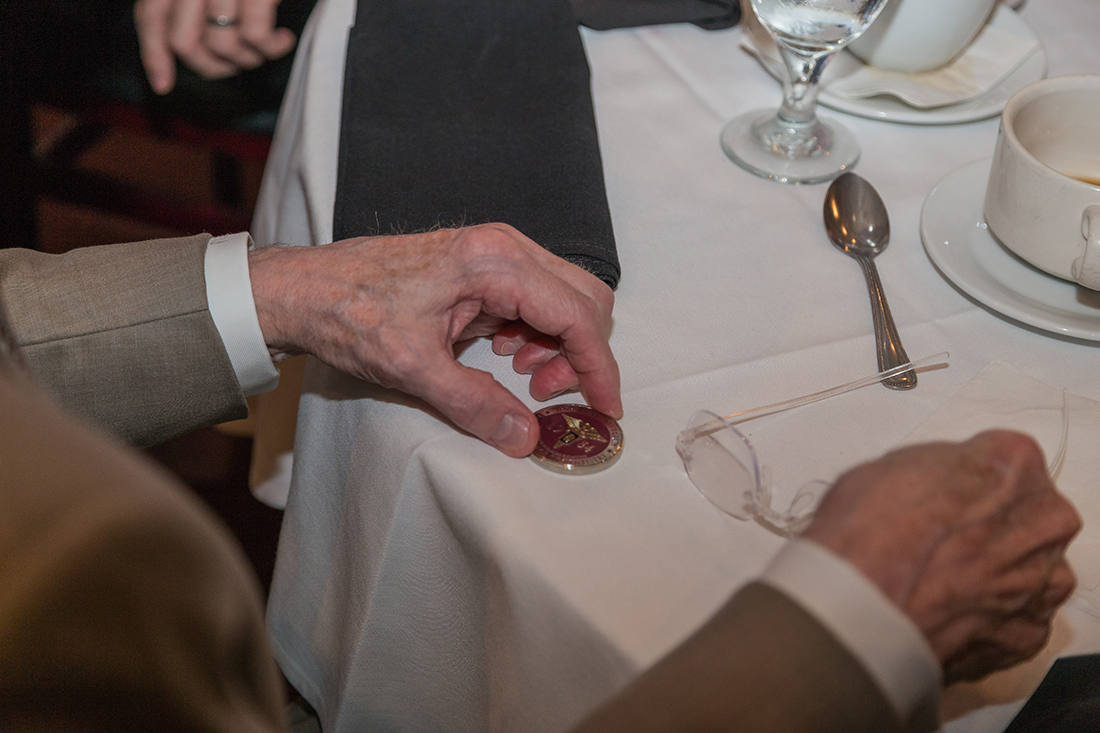 The Challenge Coin, like this one, above, is awarded each year during the Graduate Prosthodontics Annual Recognition Dinner.