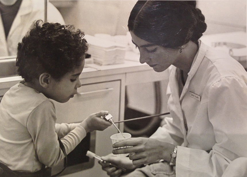 Dr. Janice DeWald, then a first-year dental hygiene student at the University of Iowa College of Dentistry, with her first pediatric dentistry patient