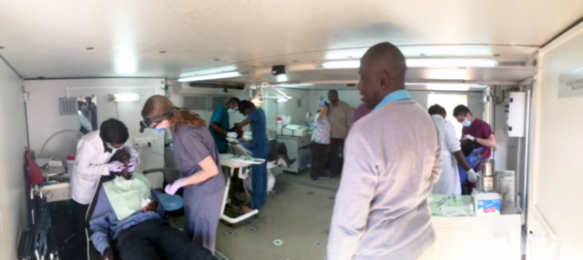 In Kitwe, Zambia, treating patients in a mobile dental unit
