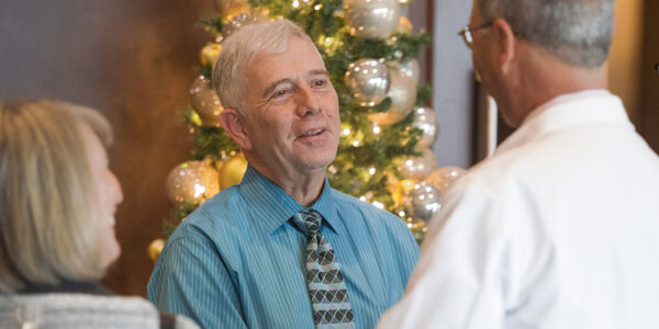 Dr. Harvey Kessler and his wife, Lynn, speak with Dean Lawrence Wolinsky