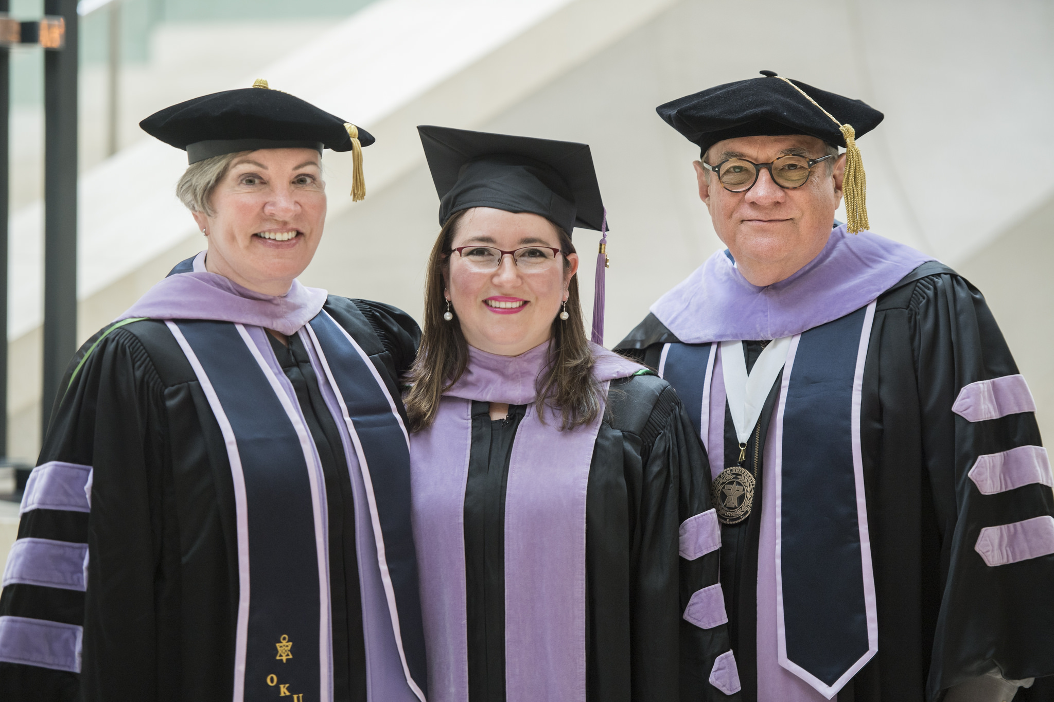 Dr. Regina Casian, the first graduate of the college's oral and maxillofacial radiology residency, with Dr. Diane Flint, associate professor and residency program director, and Dr. Byron Benson, Regents professor in diagnostic sciences and imaging center director