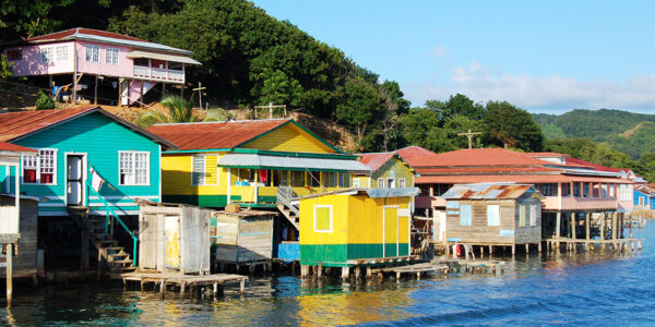 Houses built on stilts along the coast of Roatan, Honduras