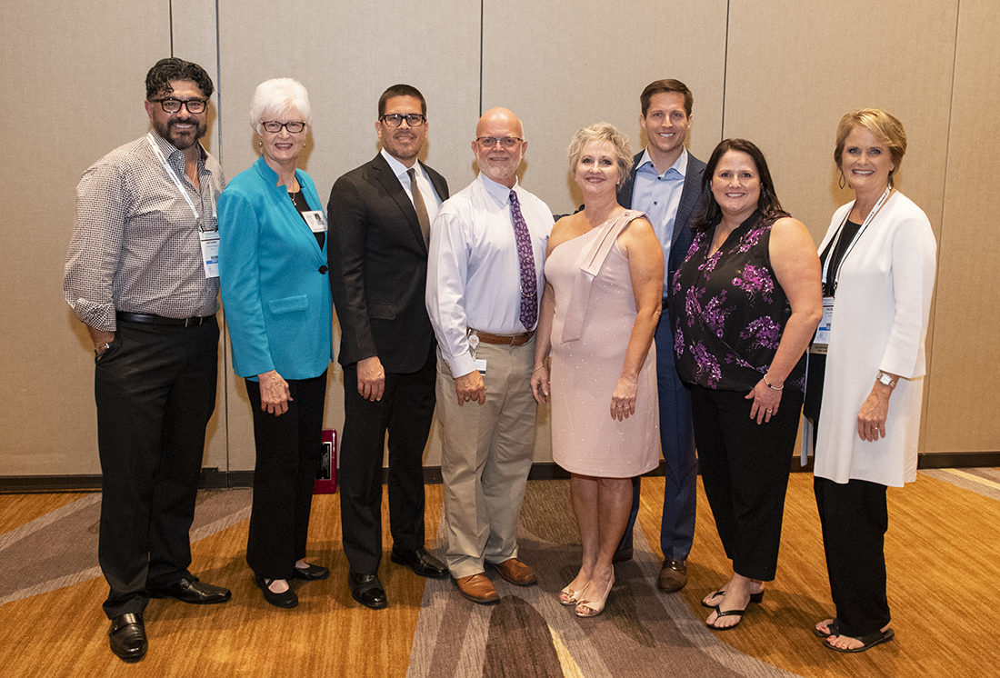 Alumni Association board members, left to right: Dr. Anthony Mendez '04; Lana Crawford, '68, '72; Dr. Eduardo Lorenzana '96; Dr. Joe Simmons III '98, '99; Dr. Danette McNew '88; Dr. Chad Capps '08; Laurie Inglis '02; and Dr. Julie Stelly '87