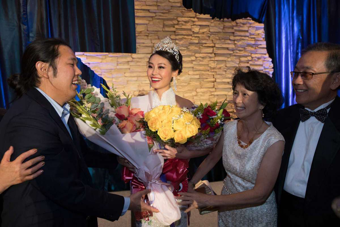 D1 Karen Yen, center, after winning the Miss Chinatown Houston scholarship pageant in July 2018.