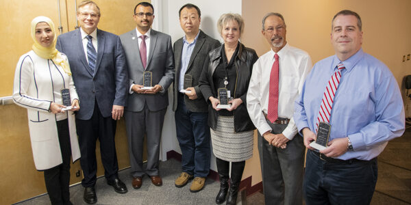 Faculty Award Recipients with Dean Wolinsky