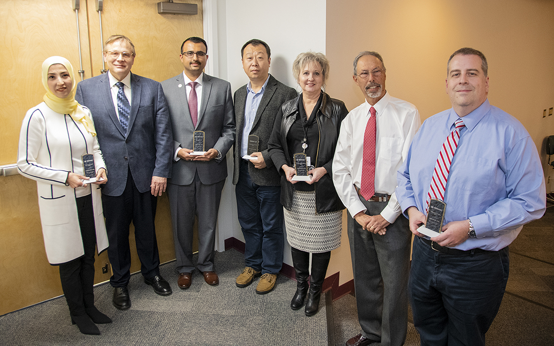 Faculty Award Recipients with Dean Wolinsky