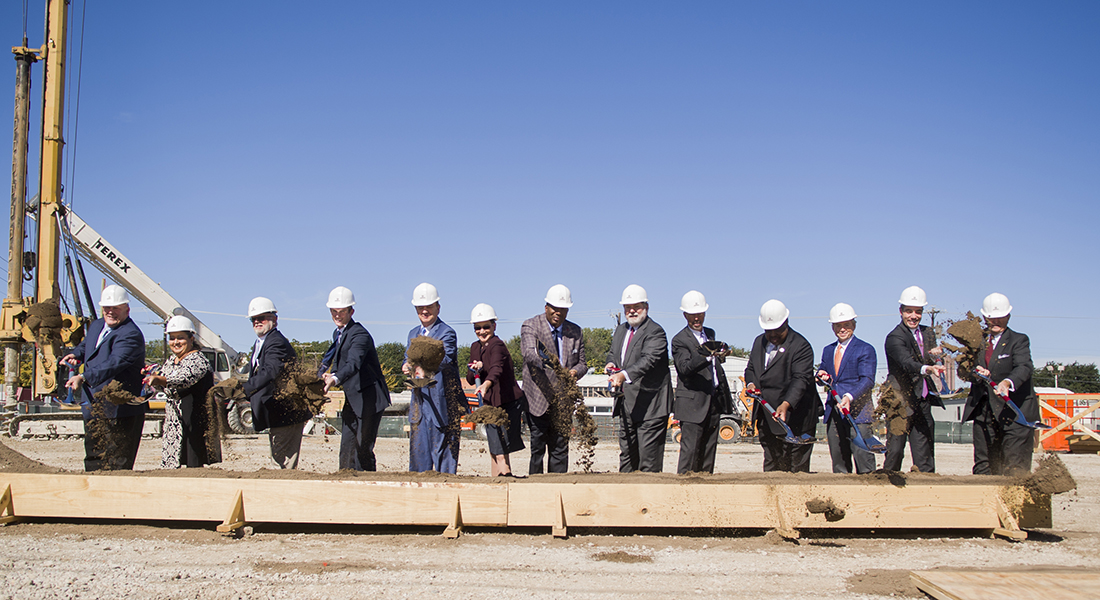 Texas A&M representatives, state elected officials and other dignitaries turn dirt at a mid-morning site dedication attended by hundreds of students, faculty, staff and friends. With Nussbaumer Street closed to traffic, a 180-foot tent accommodated a stage, seating and catered barbecue lunch.