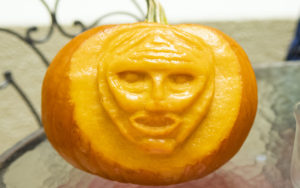 Pumpkin carved as man's face