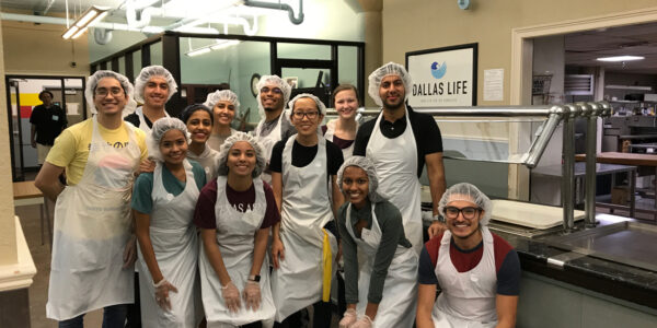 LIGHT members serve the homeless at Dallas Life.