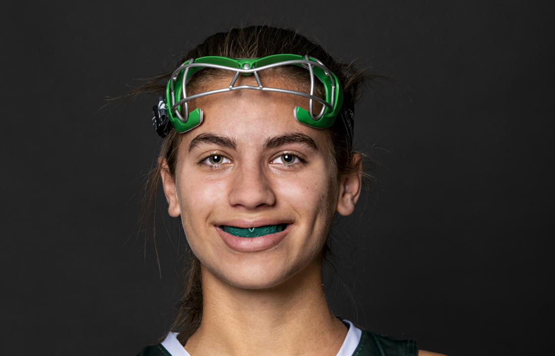 High school student Camille Green hardly notices her mouthguard while playing on the field hockey team for The Hockaday School in Dallas.