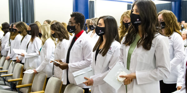 Dental hygiene students at their white coat ceremony