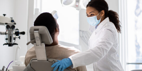 dentist listening to patient